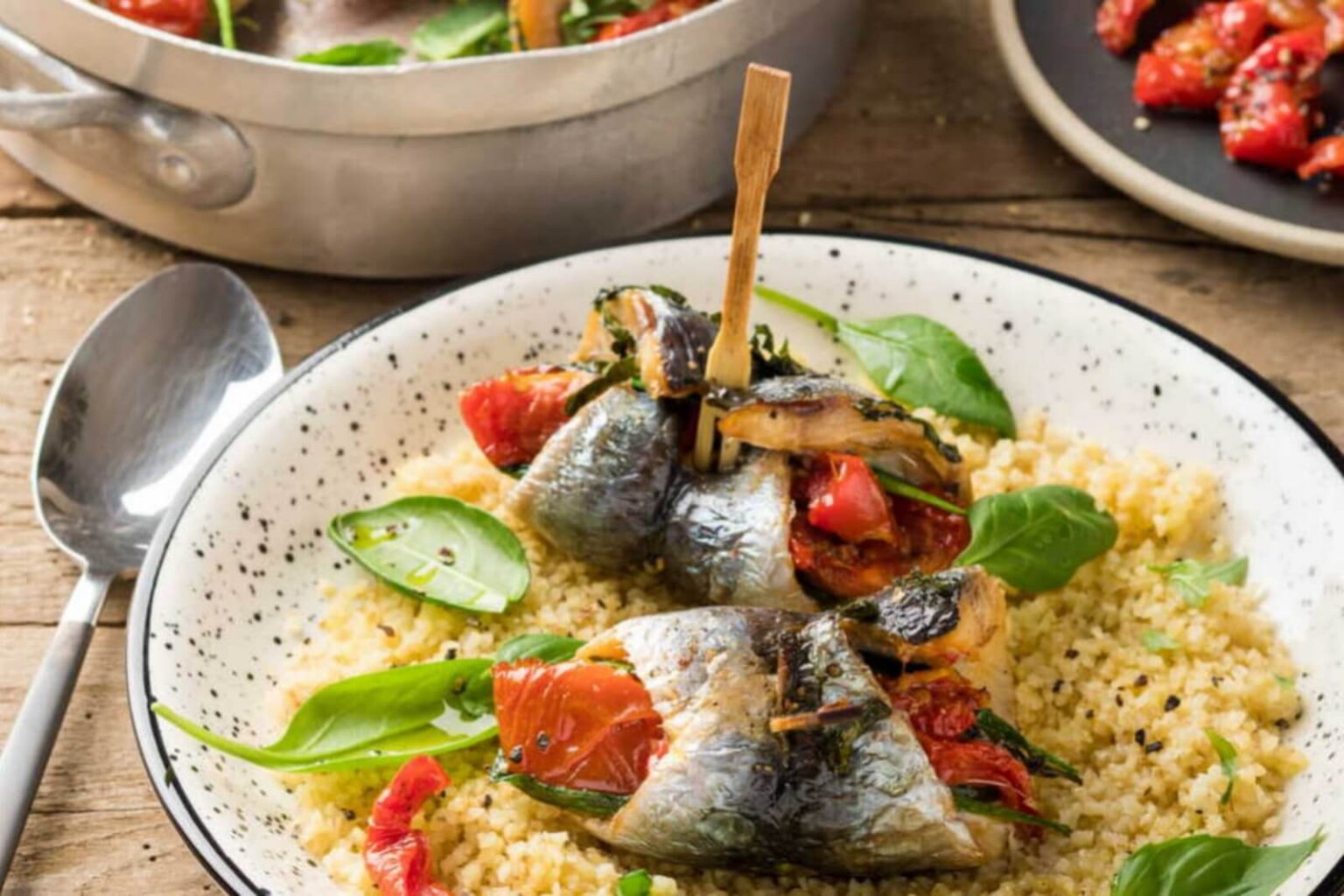 Filets de sardines farcies aux tomates confites sur couscous