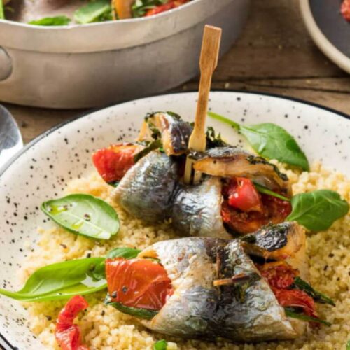 Filets de sardines farcies aux tomates confites sur couscous