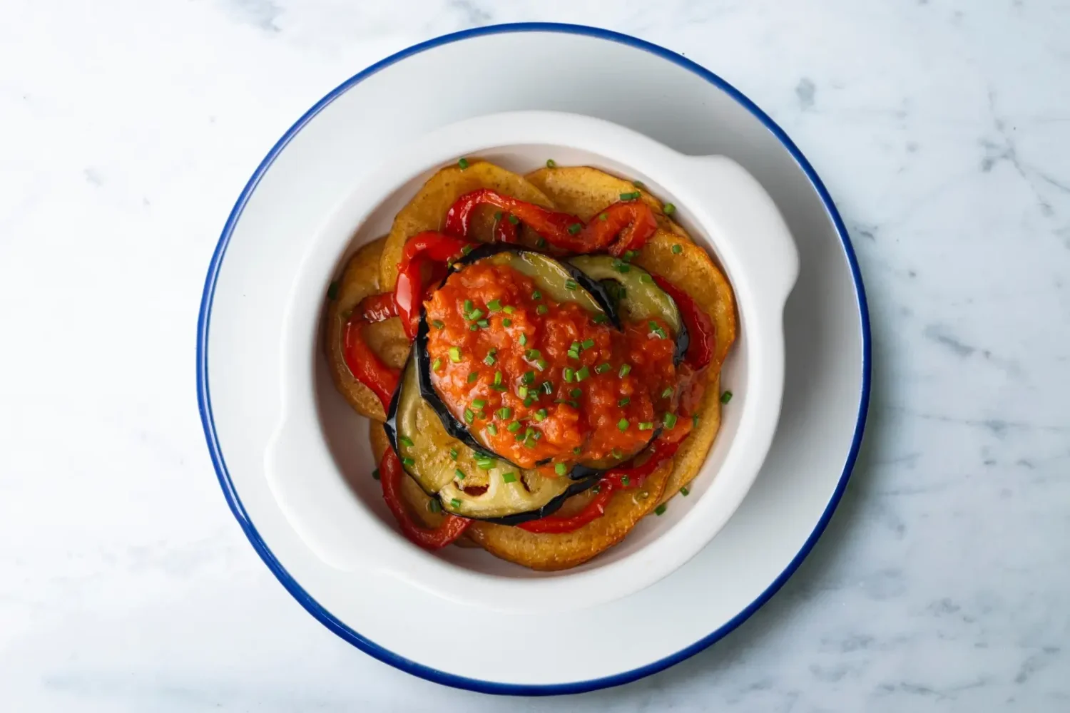 Ce gratin venu de Majorque pourrait bien devenir votre recette préférée de l’été Gratin Tumbet majorquin