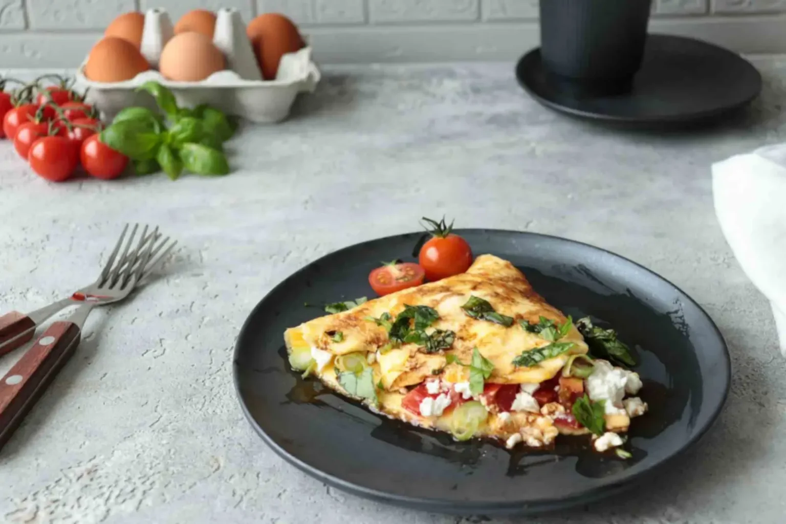 Omelette aux tomates et à la feta : la recette ultra gourmande prête en 15 minutes Omelette aux tomates et à la feta