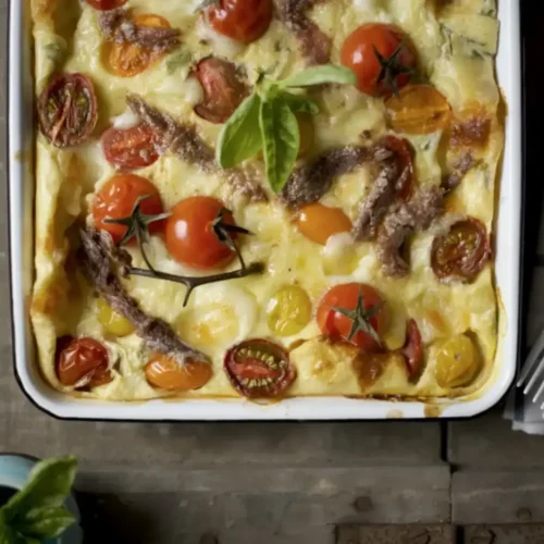 clafoutis à la mozzarella, aux tomates cerises, aux anchois et au basilic
