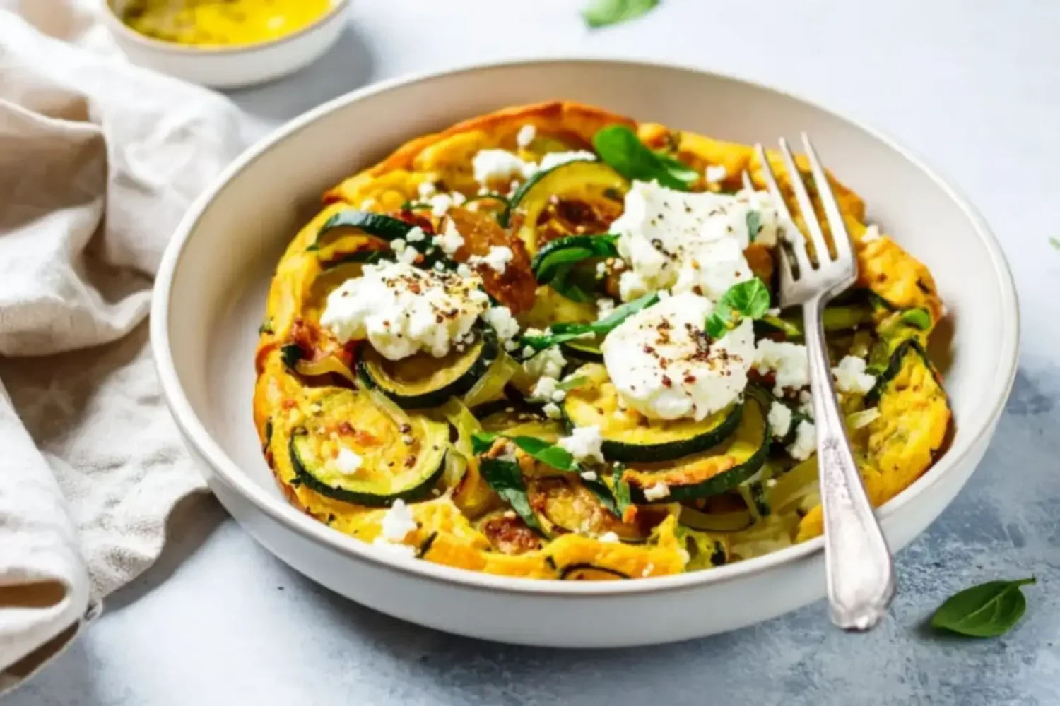 Quiche sans pâte aux courgettes : le dîner fondant et léger qui plaît à toute la famille Quiche sans pâte aux courgettes