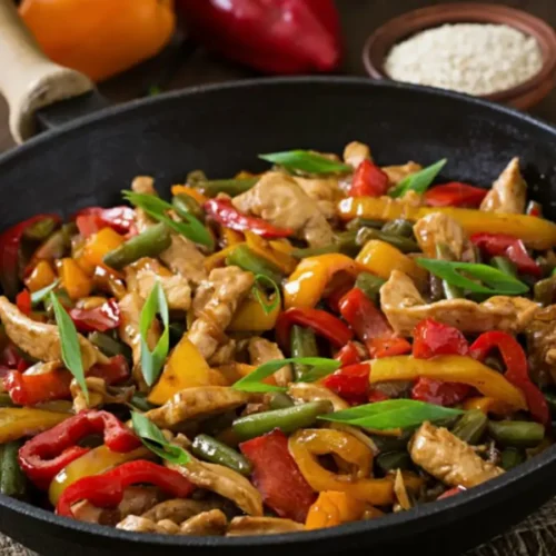 Wok de poulet aux poivrons